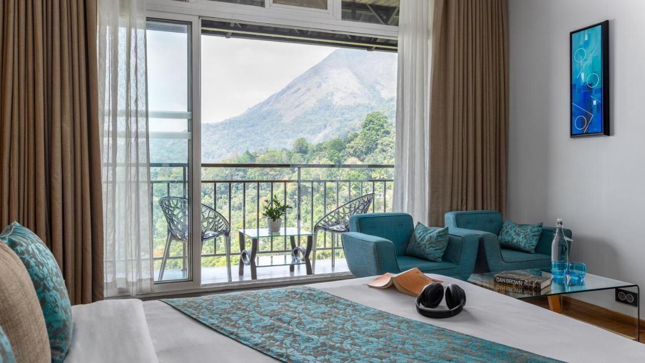 Отель The Panoramic Getaway Муннар Экстерьер фото View of Mount Apo from the hotel