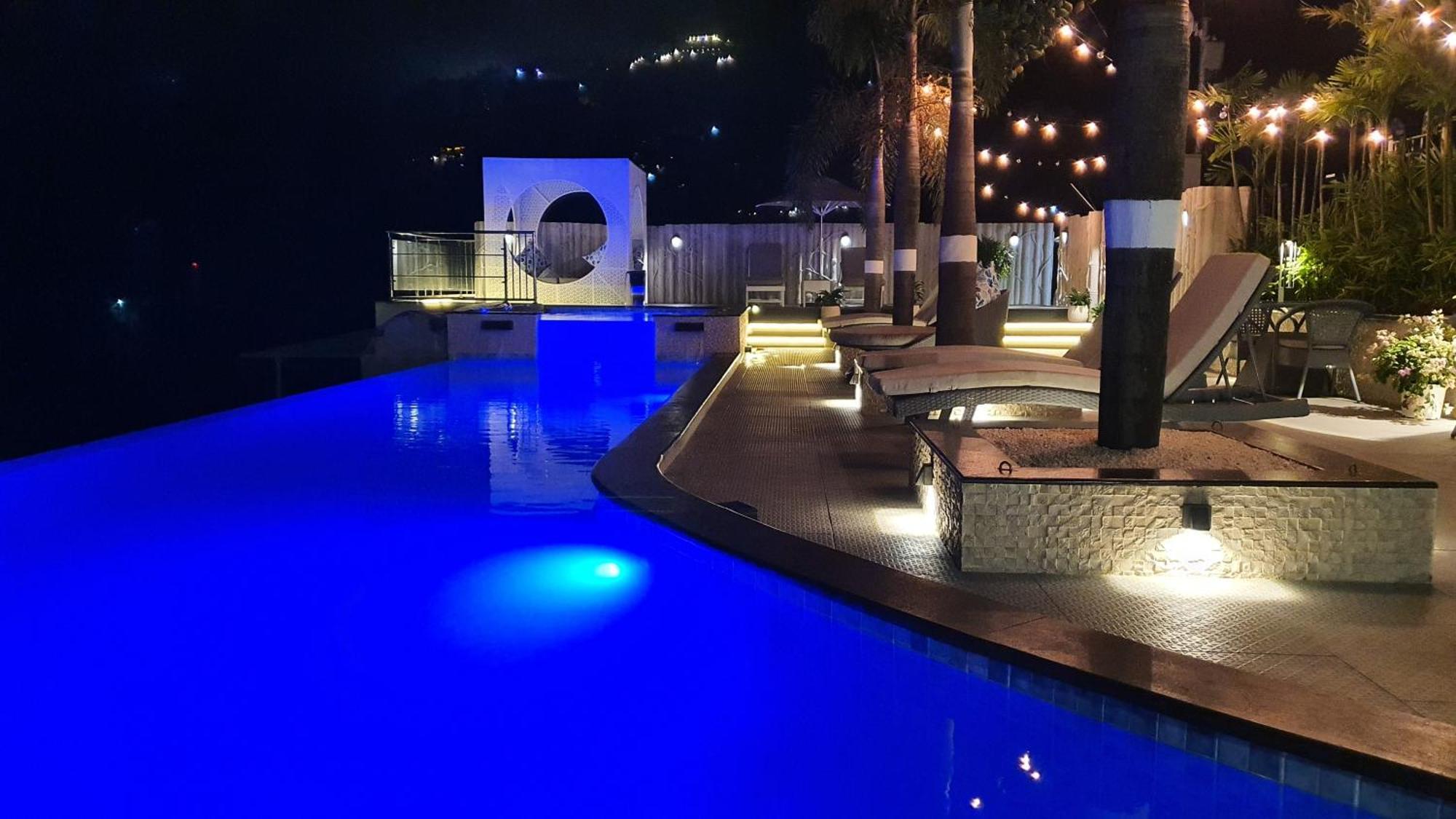 Отель The Panoramic Getaway Муннар Экстерьер фото The pool at the hotel