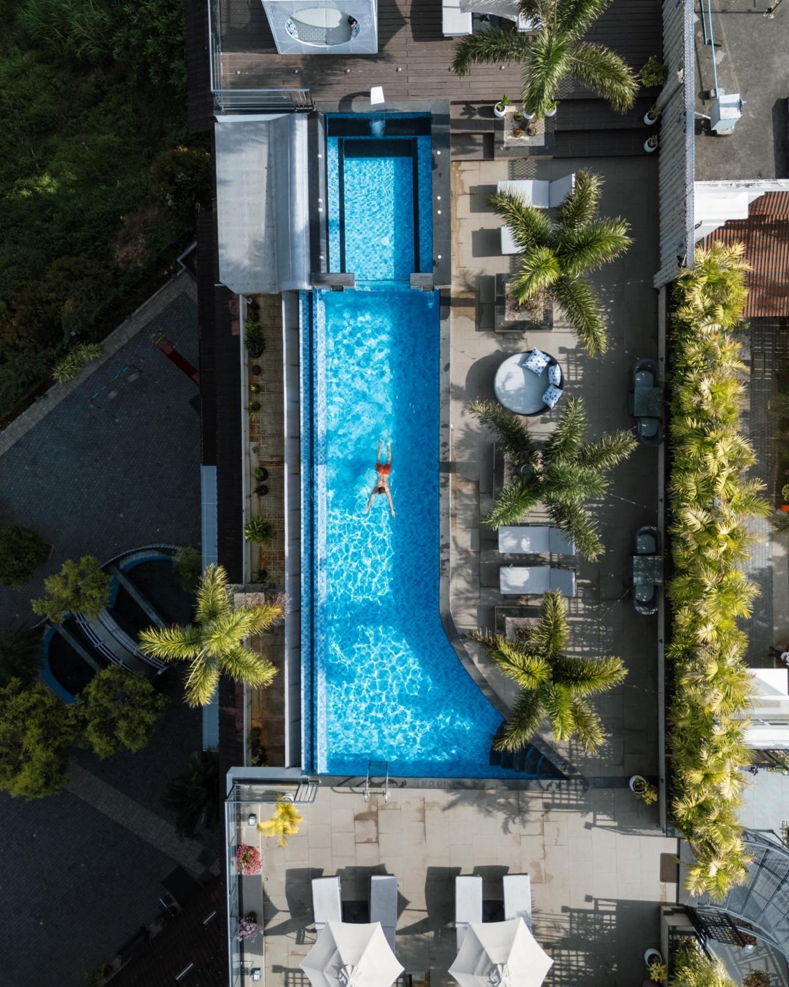 Отель The Panoramic Getaway Муннар Экстерьер фото Aerial view of the pool