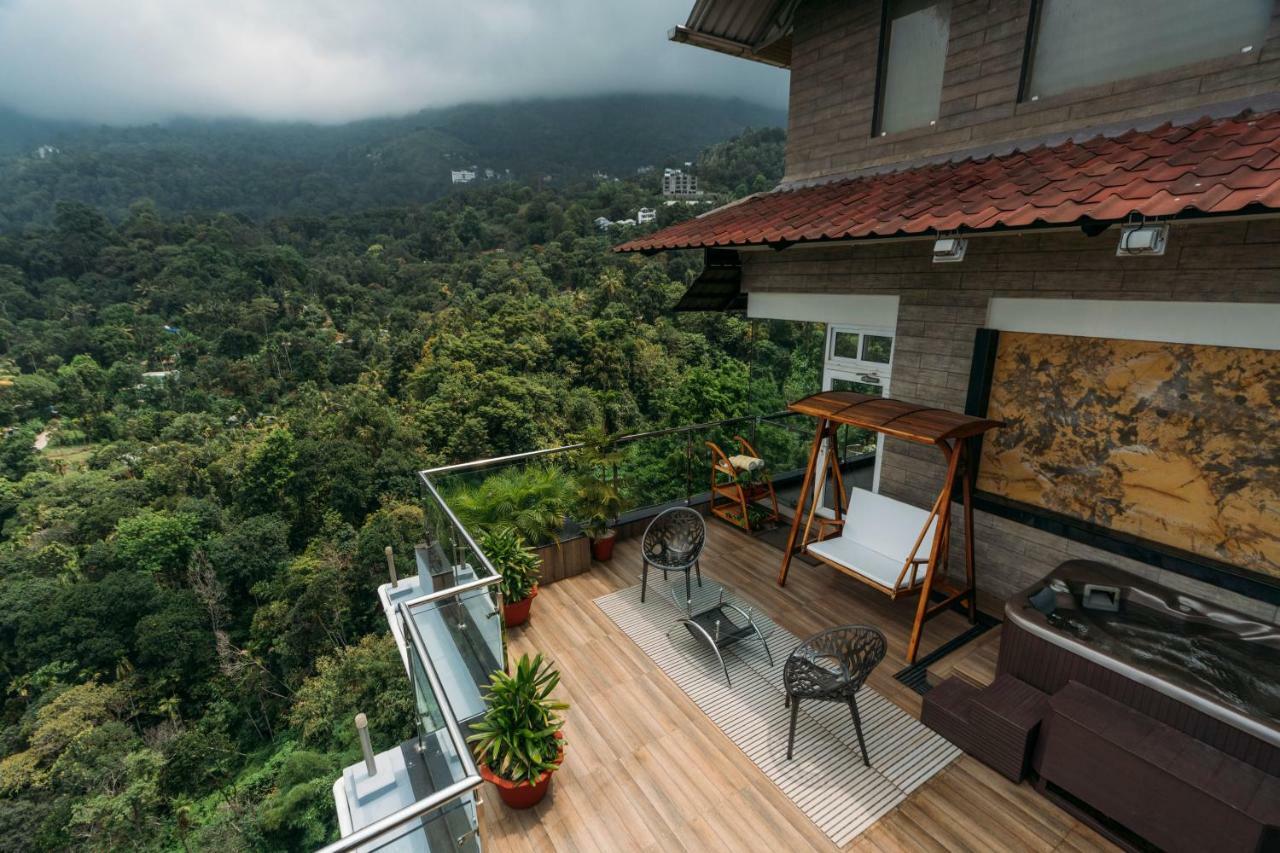 Отель The Panoramic Getaway Муннар Экстерьер фото A view from the balcony of a house in Kerala, India