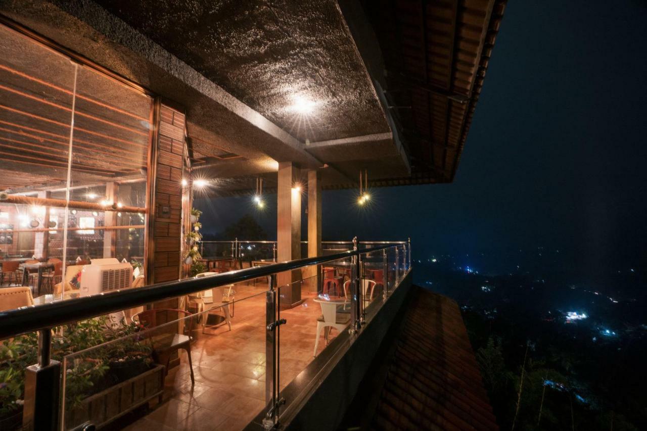 Отель The Panoramic Getaway Муннар Экстерьер фото The restaurant at the top of the tower